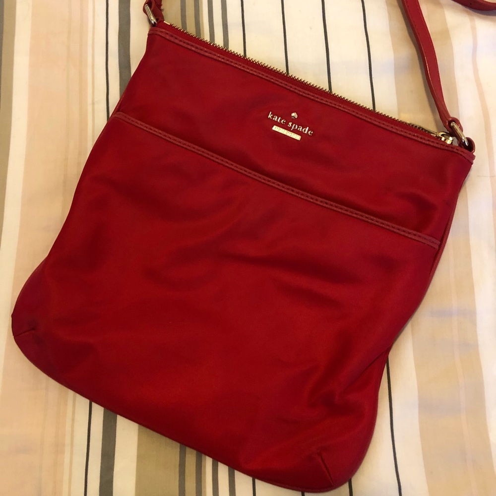 Red Kate Spade crossbody purse
